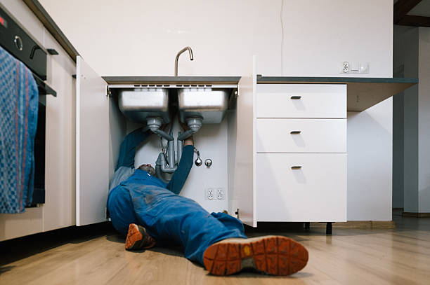Professional Emergency Plumber technician working in Piedmont, OK